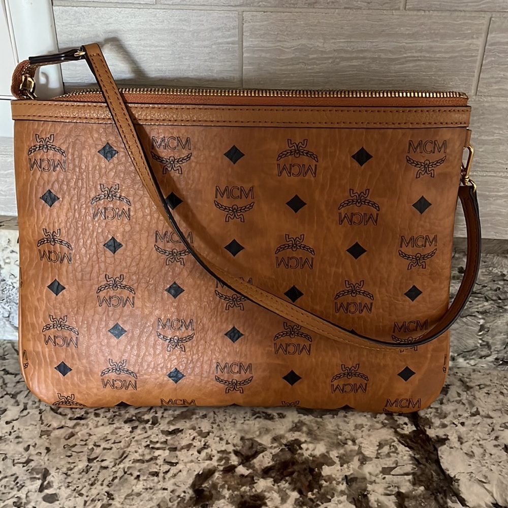 MCM pouch with strap in cognac great condition